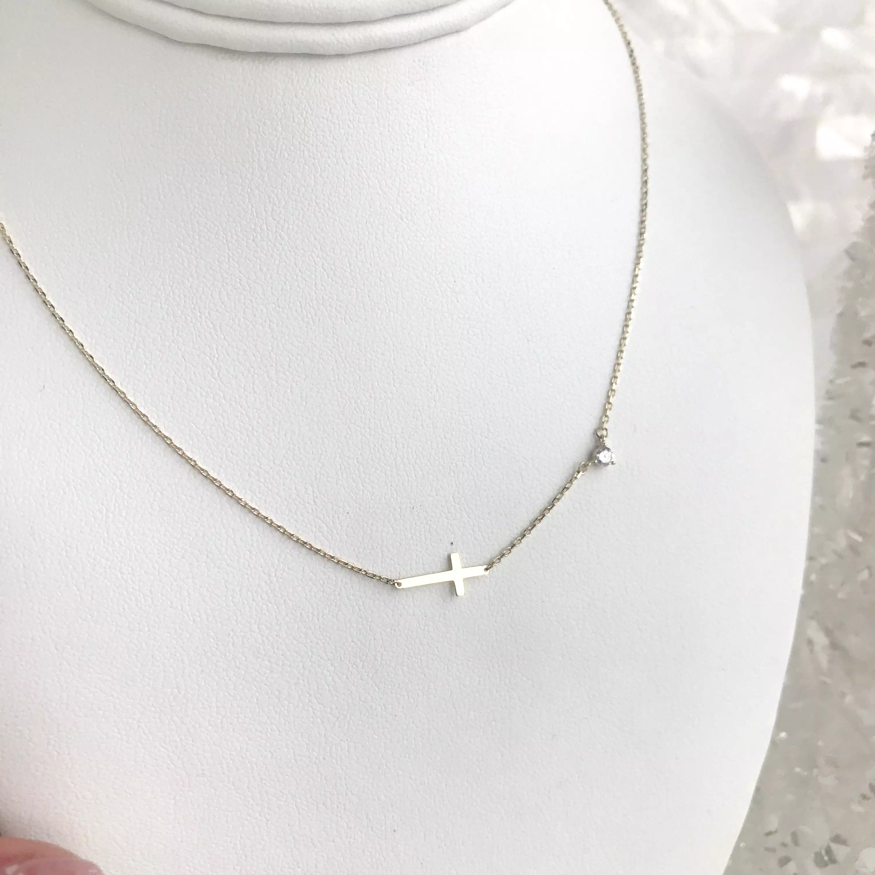 10K Gold Sideways Cross Necklace with CZ